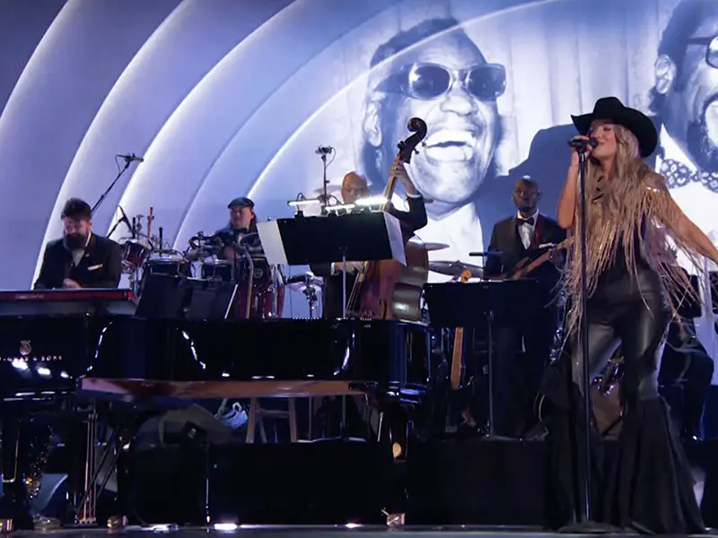 Taku Hirano plays with Lainey Wilson during the Quincy Jones Tribute at the Grammy Awards