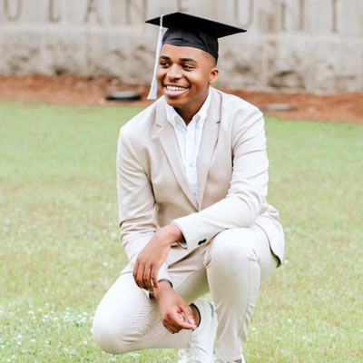 Graduating Student posing in cap