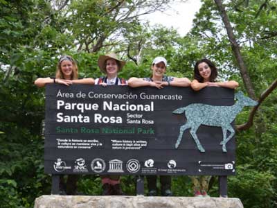 Students on park sign